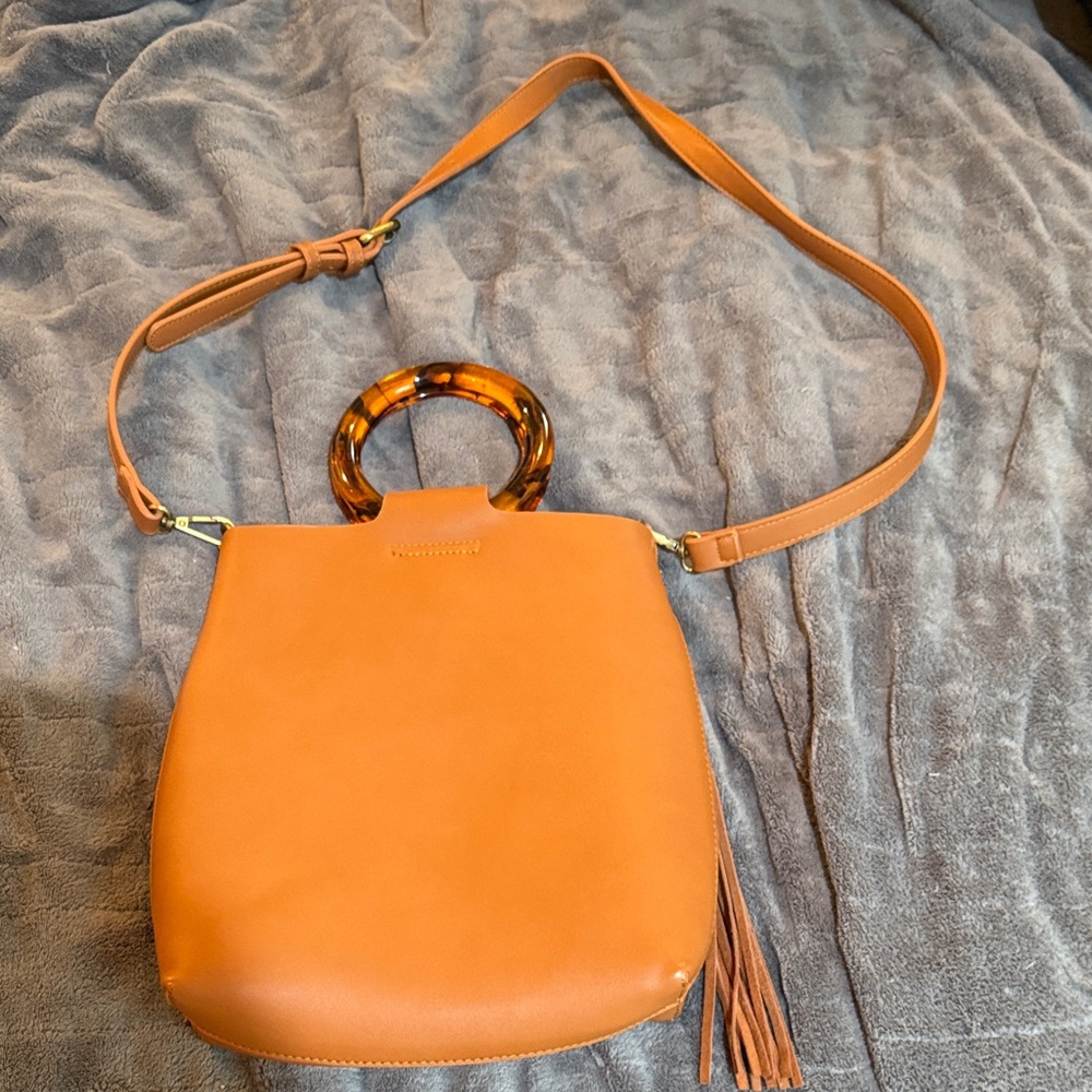 Stylish Tan Handbag with Tortoise Handle